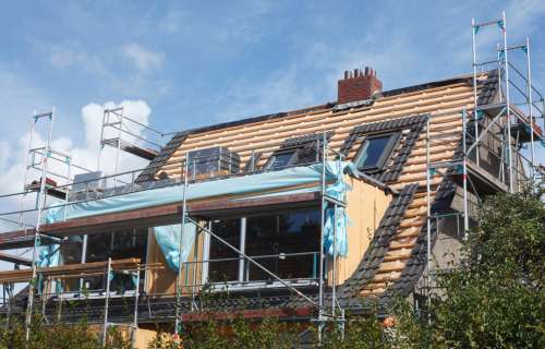 Energetische Dachsanierung mit Dachneueideckung und Dachfensteraustausch sowie Erstellung einer Gaube